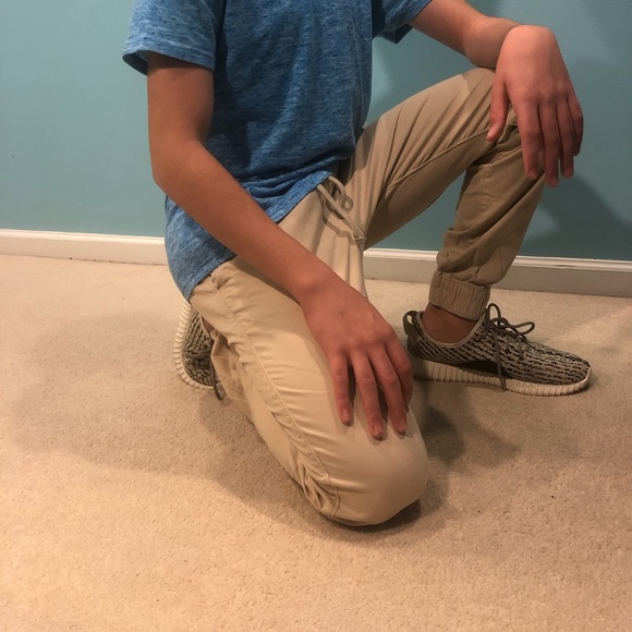 Light khaki joggers with adjustable waistband. - Picture 1 of 2